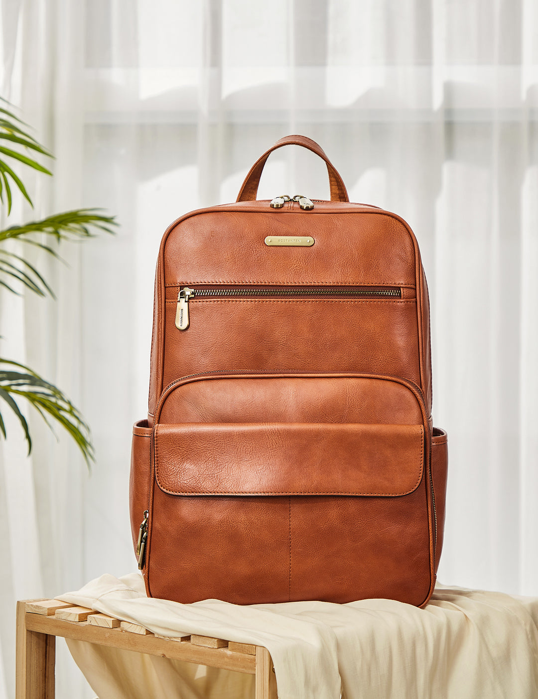 Schmaler 15,6-Zoll-Laptop-Rucksack aus braunem Leder 